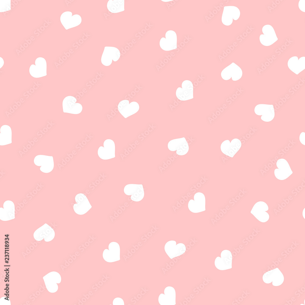 Vector seamless pattern for Valentine's Day. Cute hand drawn hearts on pink background