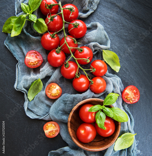 Cherry tomatoes on a black