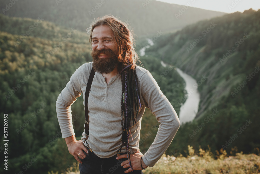 Portrait man travel brutal boho style. Tourist in outdoors