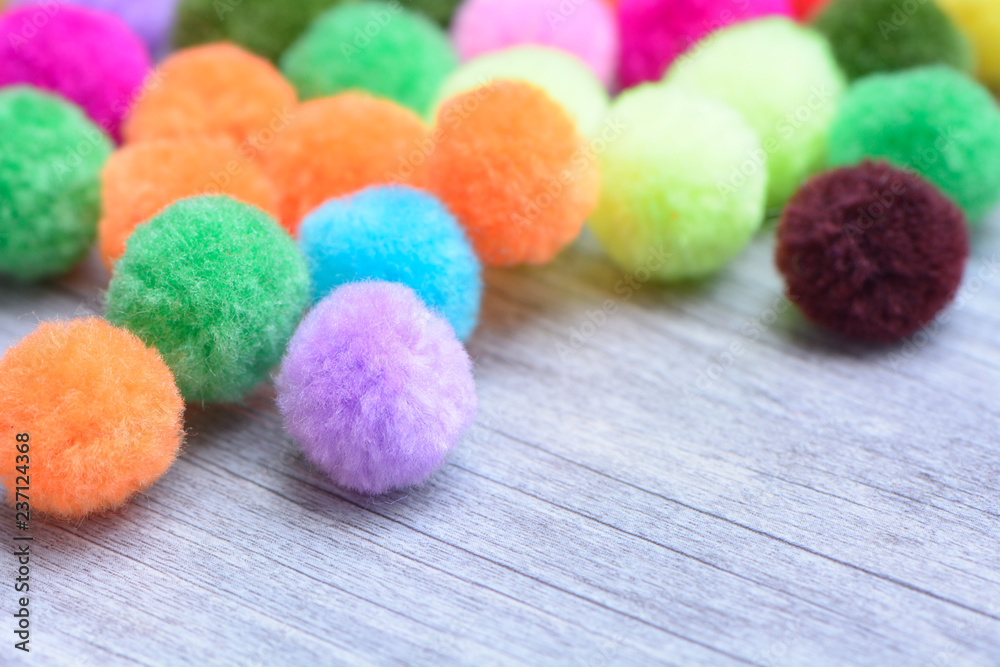 A colorful Pom Pom with white background A colorful Pom Pom with white background