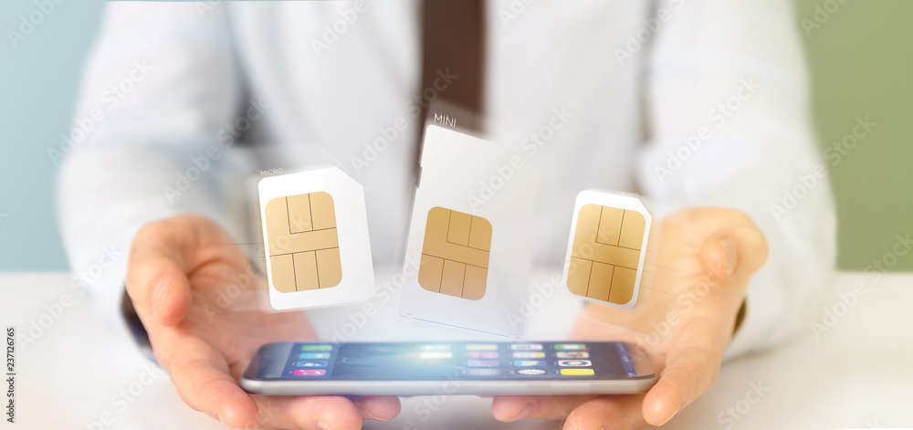 Businessman holding Different size of a smartphone sim card 3d rendering