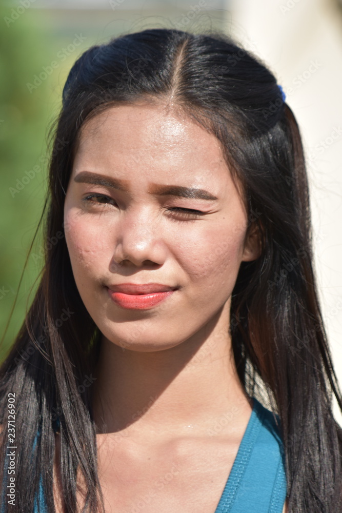 Winking Attractive Filipina Female Winking Attractive Filipina Female