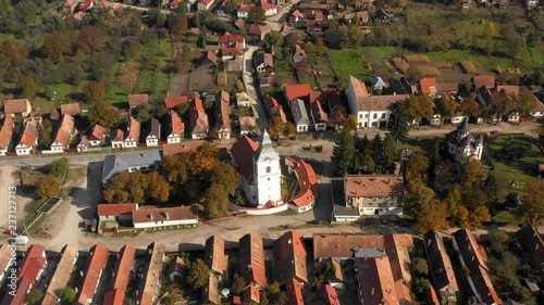Wallpaper Mural 4k aerial drone movie. Flying above Rimetea (Torocko) village in Transylvania, Romania. Rooftops of traditional houses Torontodigital.ca