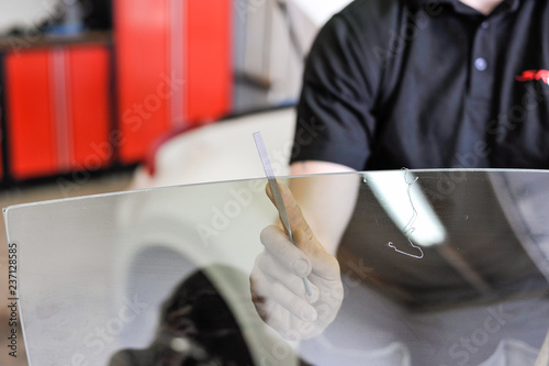 Filing windows . Professional car window tinting services.
