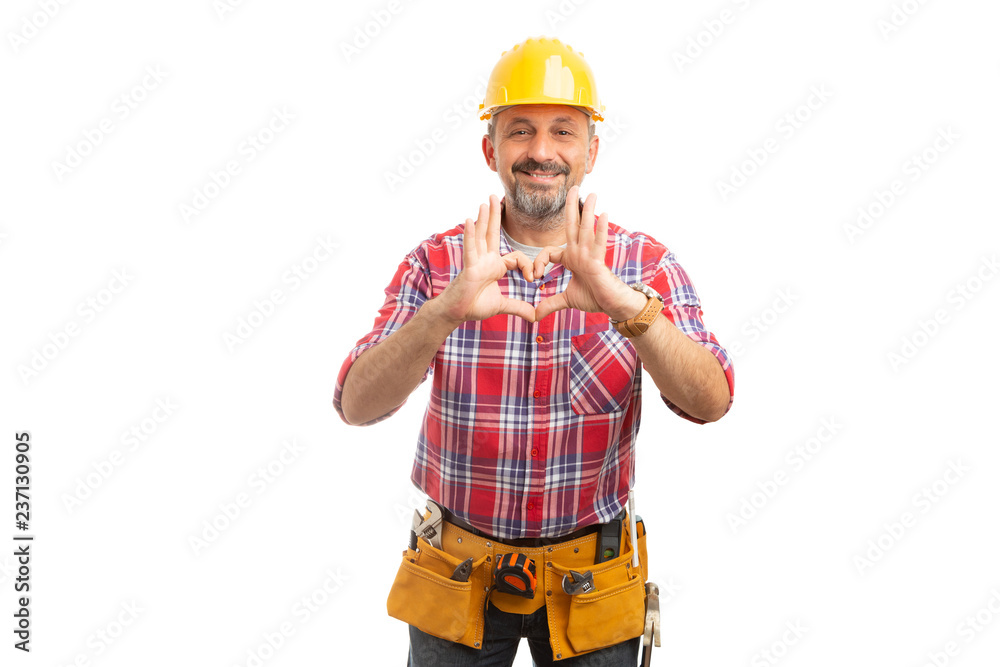 Builder holding heart symbol with fingers. Builder holding heart symbol with fingers.