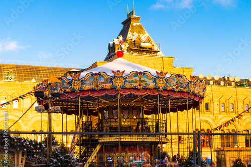 Russia, Moscow, Red Square, the carousel at the Christmas market.