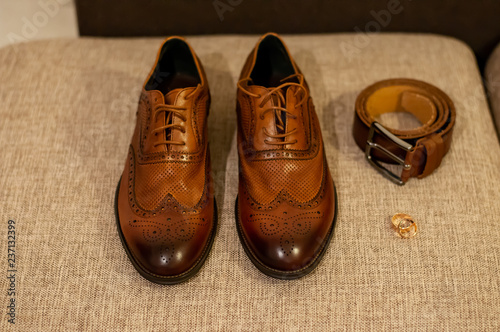 Wedding rings shoes of the groom