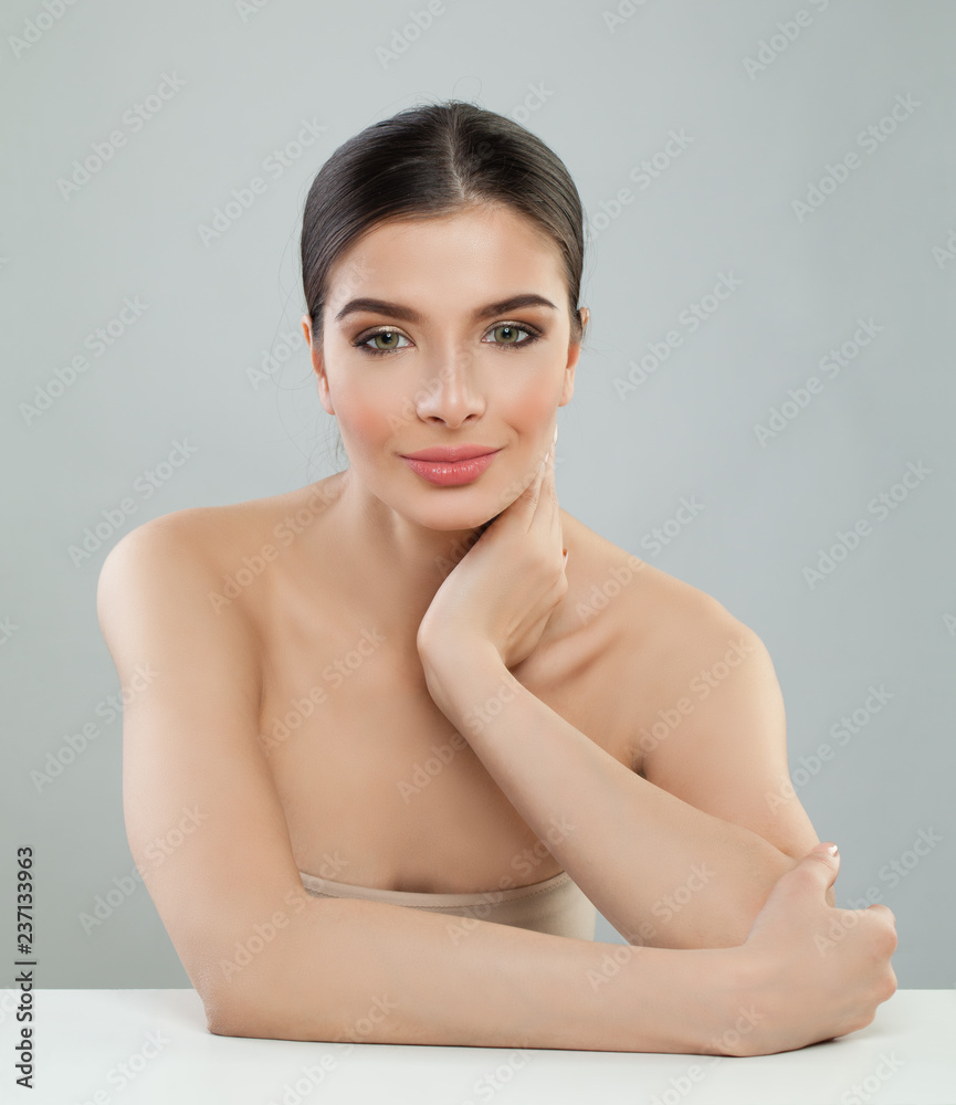 Healthy woman smiling and looking at camera Healthy woman smiling and looking at camera
