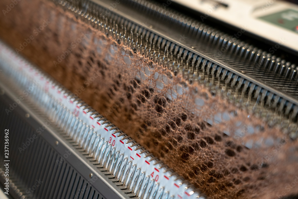 Manual knitting machine. A knitting machine is a device used to create knitted fabrics.