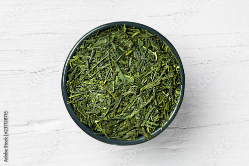 Sencha green tea on white wooden background photo