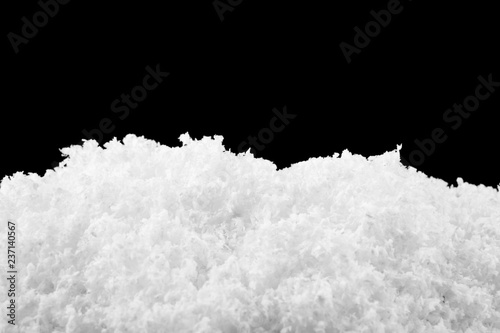 white snow isolated on black background