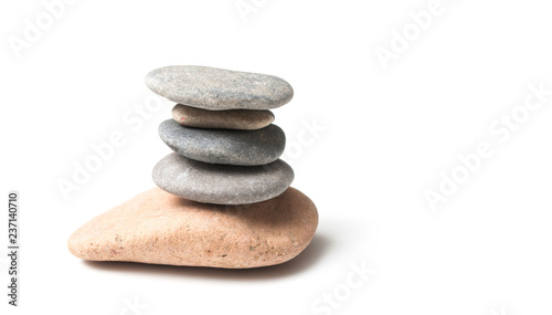 Photography closeup of stone balance on white background