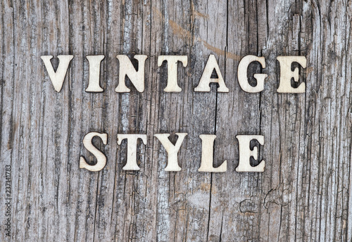 old wooden Board with vintage style text