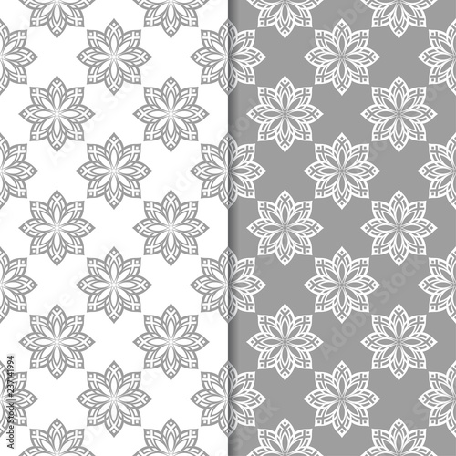 White and gray set of floral seamless patterns