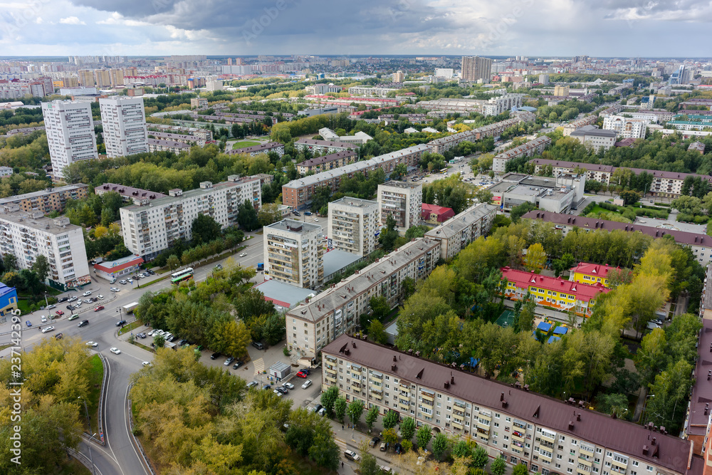Tyumen, Russia - August 25, 2015: Aerial view on sleeping neighborhood large-panel houses, so called KPD. Respubliki street