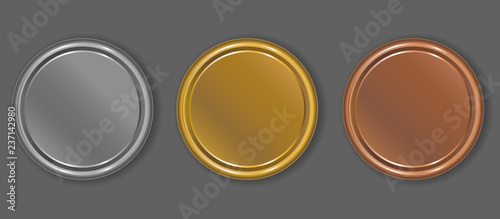 Set of gold, silver and bronze round badges on gray background. Blank medals set. Blank of coins. Vector illustration.
