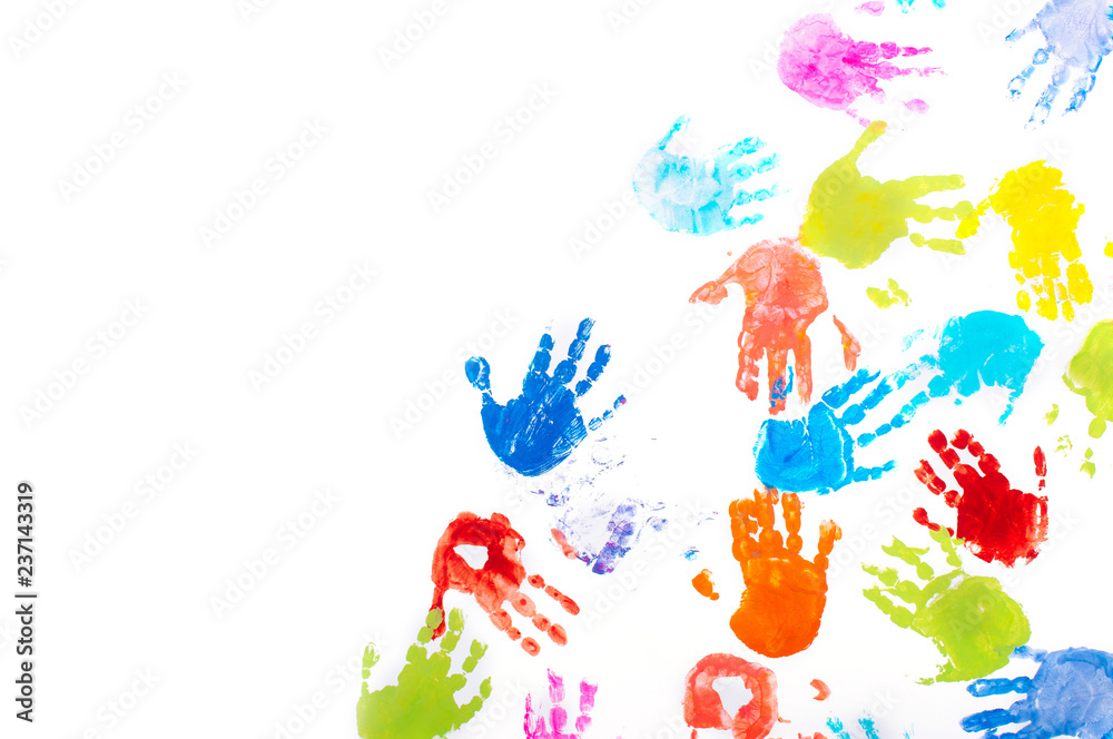 Colored kids handprints on white background with copy space Colored kids handprints on white background with copy space