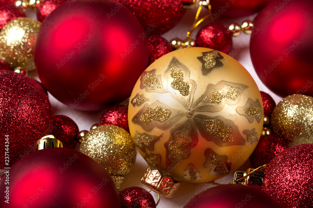 Yellow and red Christmas balls. White background. Yellow and red Christmas balls. White background.