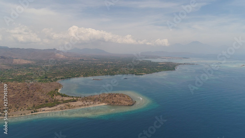 sea coast with tropical beach. aerial seascape tropical landscape, sea, boats on the surface water. Bali,Indonesia, travel concept.