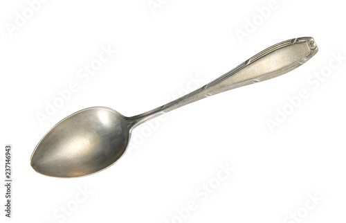 Top view of old silver beautiful tea spoon isolated on white background