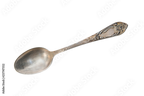 Vintage tea spoon  isolated on a white background. Retro silverware.