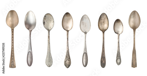 Vintage tea spoons isolated on a white background. Retro silverware.