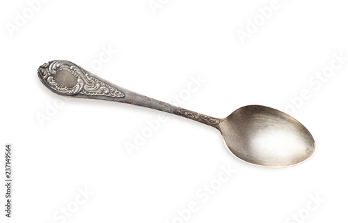 Vintage spoon isolated on a white background. Retro silverware.
