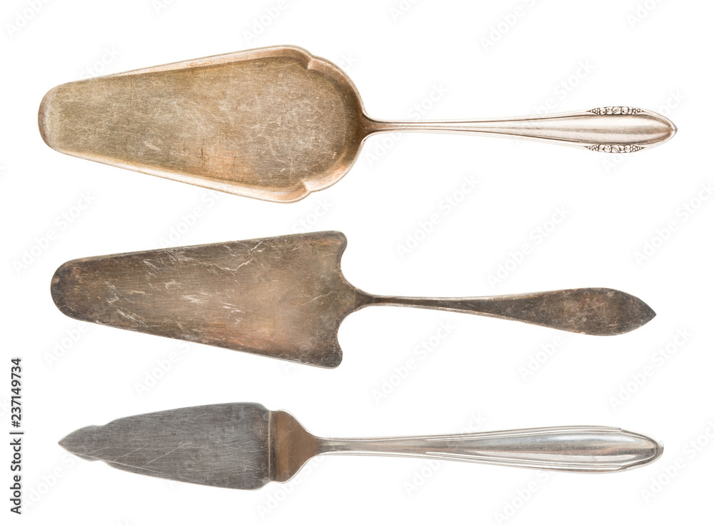 Fototapeta premium Silver Vintage Cake Spatulas isolated on white Background. Retro silverware.