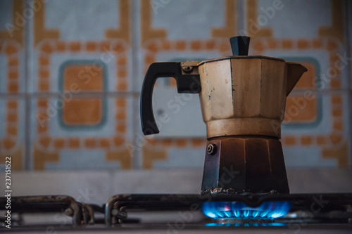 Classic Italian coffee maker on gas fire