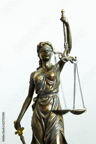 Foto Justitia statue with blindfold, sword and balance