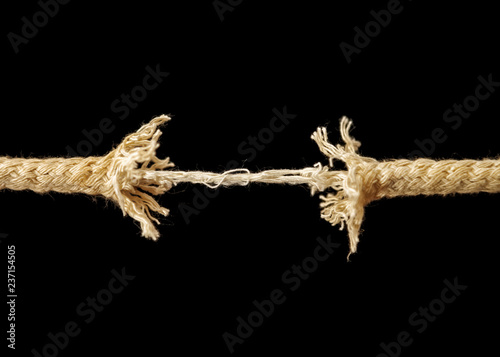 Piece of frayed rope about to break