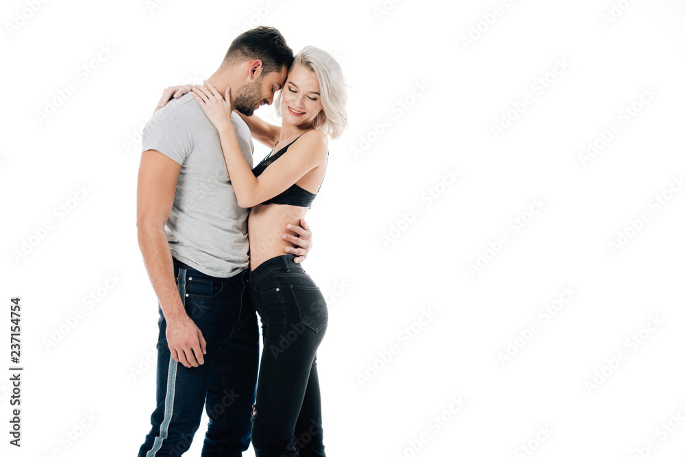 smiling heterosexual couple hugging isolated on white smiling heterosexual couple hugging isolated on white
