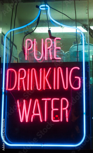 pure drinking water neon advertising sign in a store window