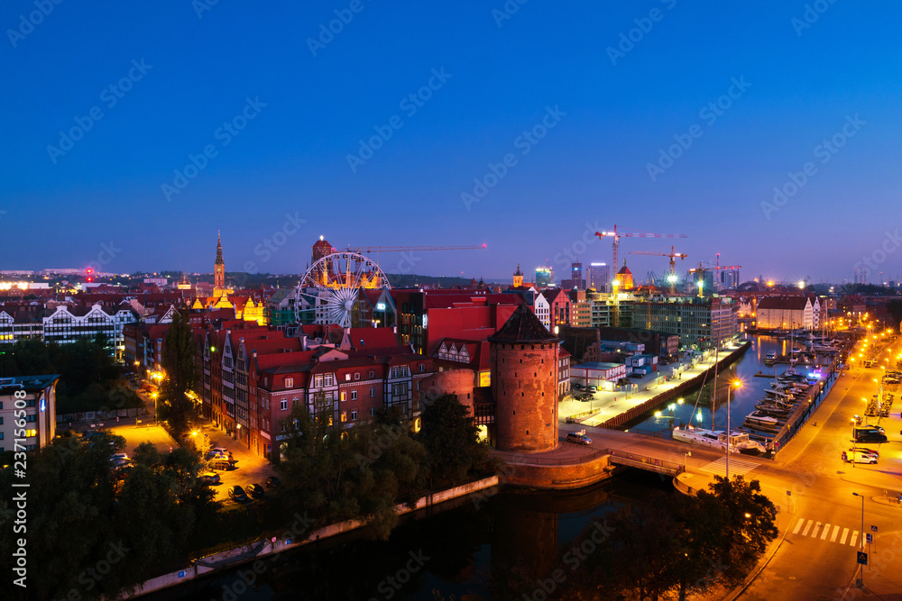 Night view of Brama Stagiewna and other historical buildings in Gdansk, Poland