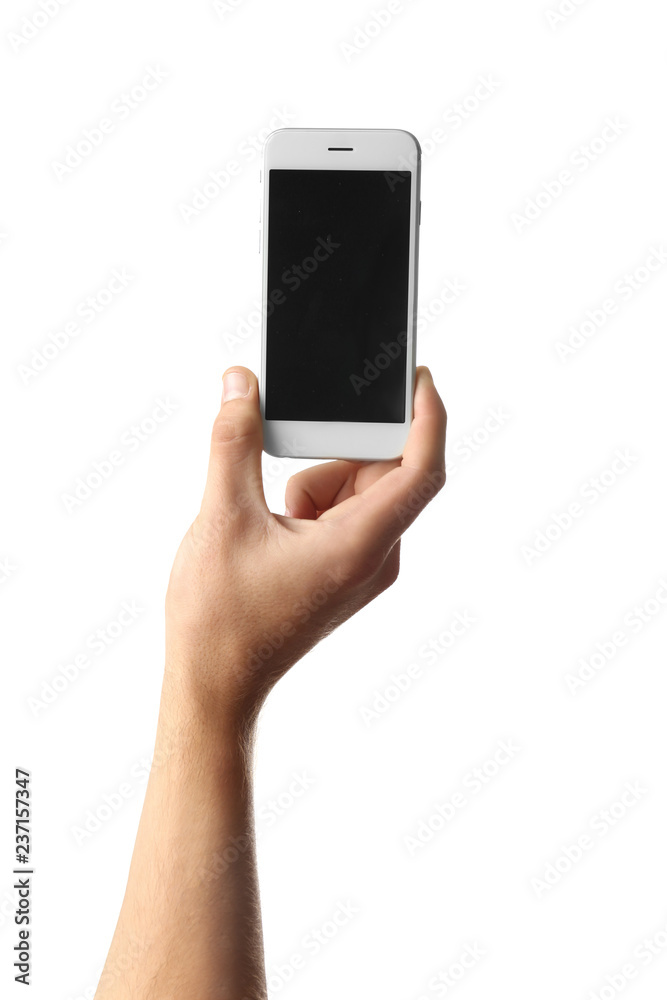Young man holding mobile phone on white background Young man holding mobile phone on white background