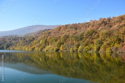 Small lake in autumn. Beautiful, colorful autumn lake