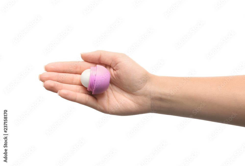 Woman holding hygienic lipstick on white background Woman holding hygienic lipstick on white background