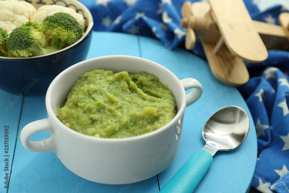 Casserole with healthy baby food on table Casserole with healthy baby food on table