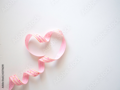 Fototapeta Naklejka Na Ścianę i Meble -  Pink Heart Ribbon on white