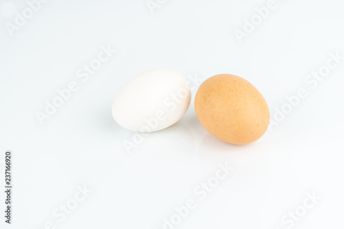 Two eggs isolated on white, copy space