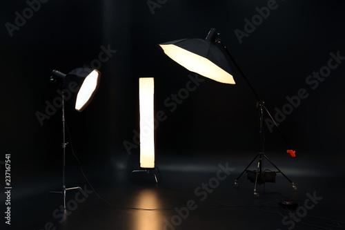 Professional lighting equipment on dark background