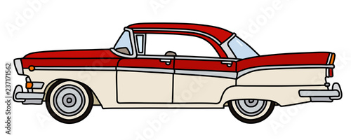 The old red and white american car