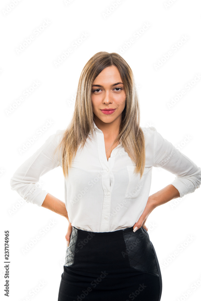 Young beautiful business woman posing with hands on shoulders Young beautiful business woman posing with hands on shoulders