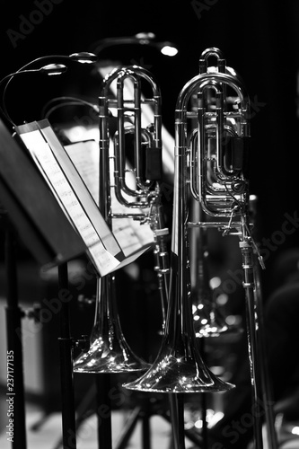 Canvas Print Trombones on stage in a symphony orchestra in black and white