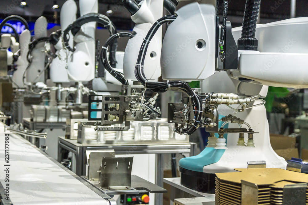 robot arm in factory robot arm in factory