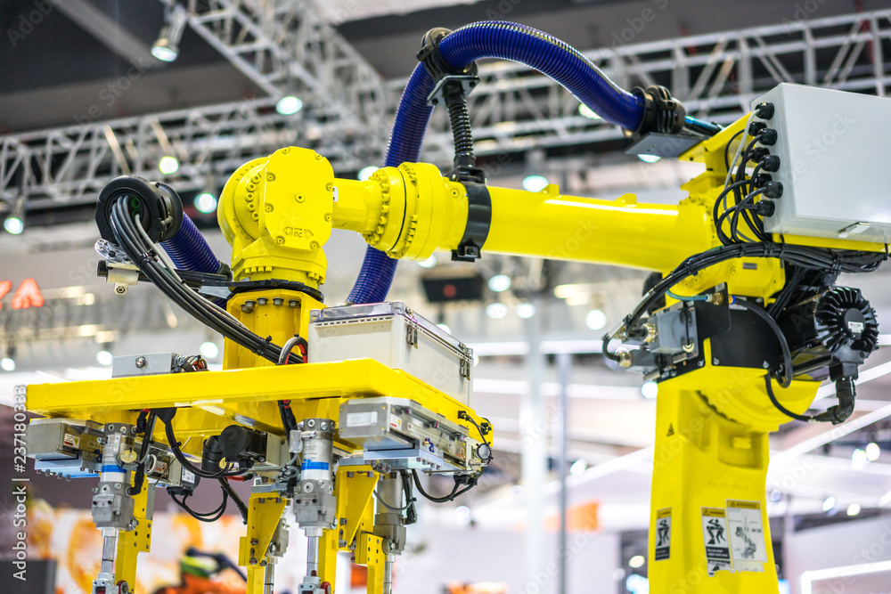 robot arm in factory robot arm in factory