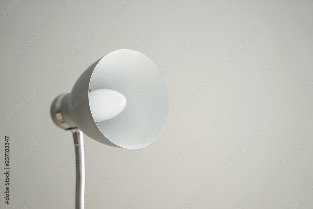 Stylish table lamp on grey background Stylish table lamp on grey background