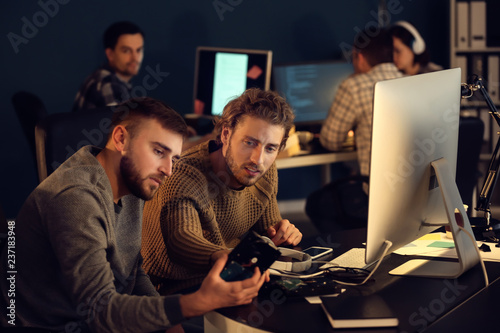 IT specialists working in o...