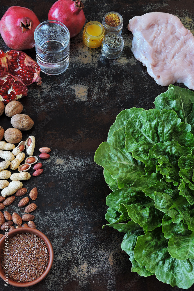 A set of products for a healthy diet. Turkey breast, green salad, nuts A set of products for a healthy diet. Turkey breast, green salad, nuts