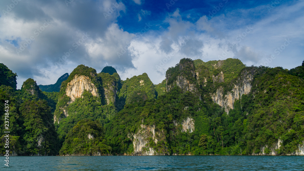 Panoramic view to landscape with mountains and Cheow lan lake natural attractions in Khao Sok National Park, Surat Thani Province, Thailand.